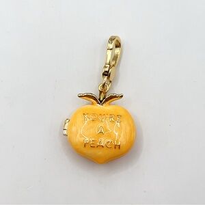 Juicy Couture peach charm